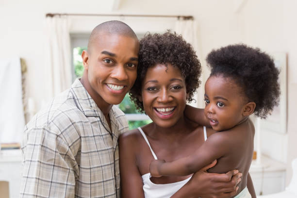 istock Happy couple with baby daughter 843749370