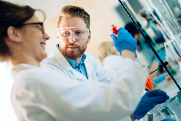 istock Young students of chemistry working in laboratory 843751566