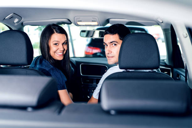 istock Young Couple in a car 843751650