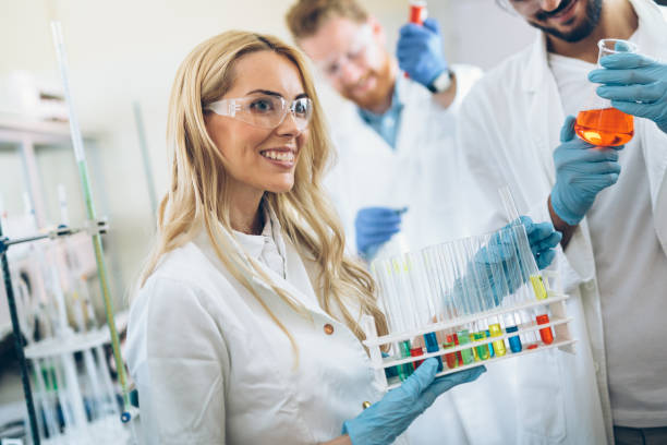 istock Female student of chemistry working in laboratory 843751806