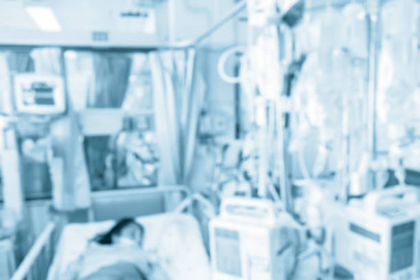 istock Blurred background patient in hospital -abstract blur emergency or in patient room with rigging the string of saline infusion for background 843755532