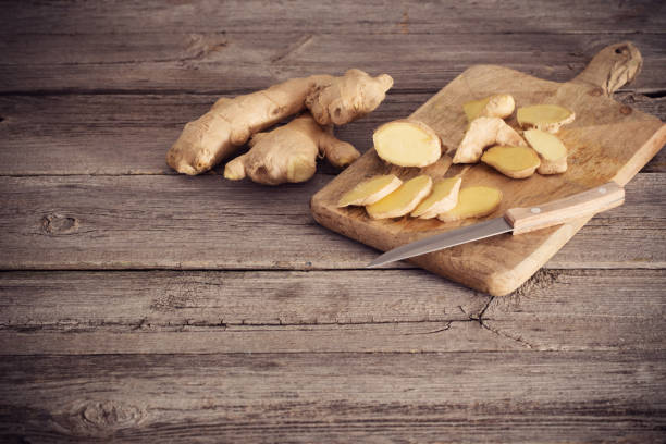 istock Ginger on wooden background 843781518