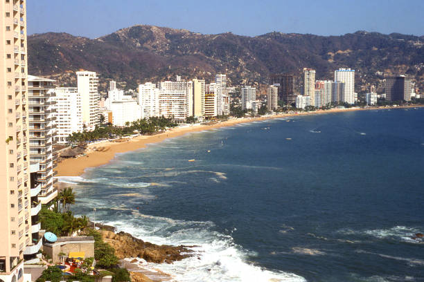 istock Beachfront view and ocean waves on beach in Acapulco Guerrero Mexico 843781652