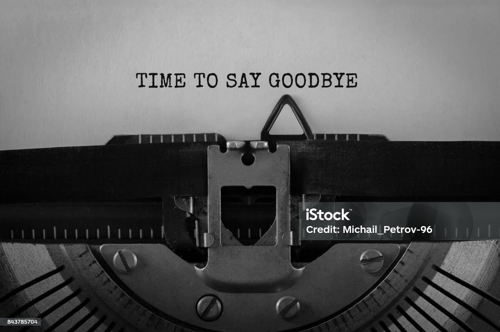 Text Time to Say Goodbye typed on retro typewriter Goodbye - Single Word Stock Photo