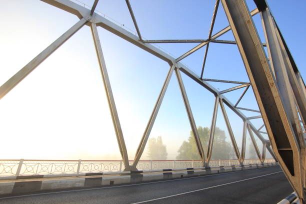 istock bridge in fog at sunrise 843785892
