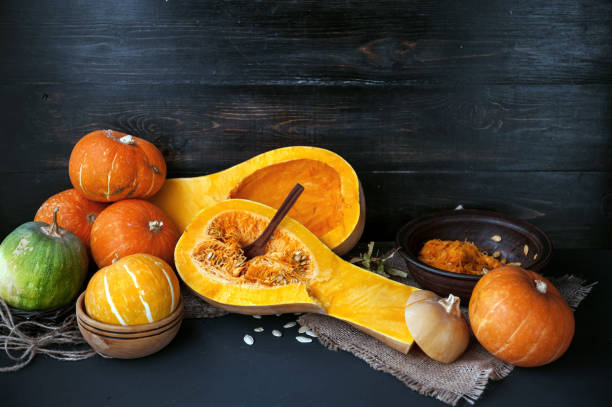 istock pumpkin with seeds on a wooden background 843793686