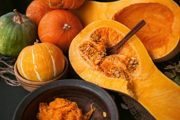 istock pumpkin with seeds on a wooden background 843793750
