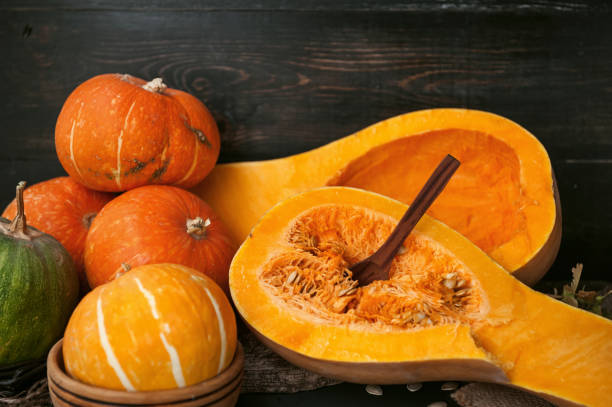 istock pumpkin with seeds on a wooden background 843793752