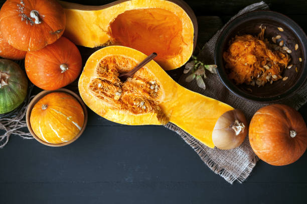 istock pumpkin with seeds on a wooden background 843793764
