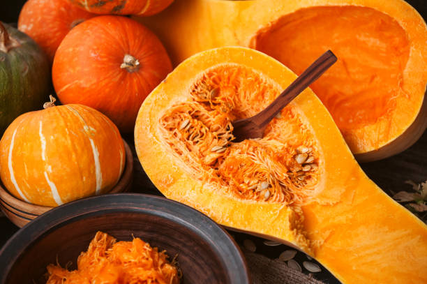 istock pumpkin with seeds on a wooden background 843793800