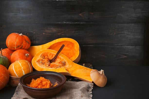 istock pumpkin with seeds on a wooden background 843793806