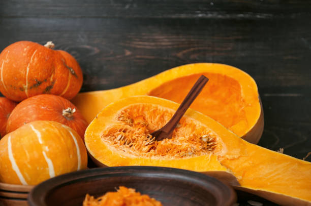 istock pumpkin with seeds on a wooden background 843793868