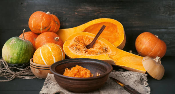 istock pumpkin with seeds on a wooden background 843793876