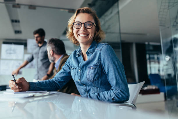 istock Female designer sitting in board room 843794170
