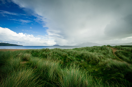 Beautiful sand dunes and wild grasses along one of the most beautiful beaches of Ireland.