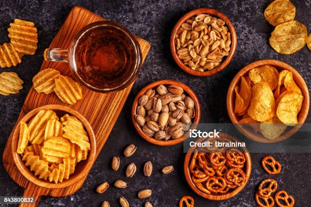 Beer With Snacks On Stone Background Stock Photo - Download Image Now - Snack, Appetizer, Alcohol - Drink