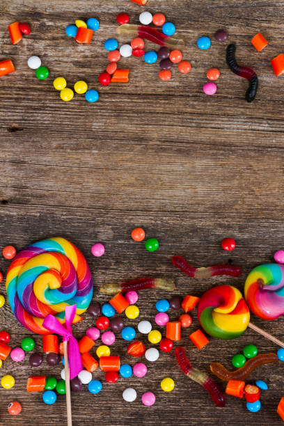 istock Colorful candies on wood 843803248