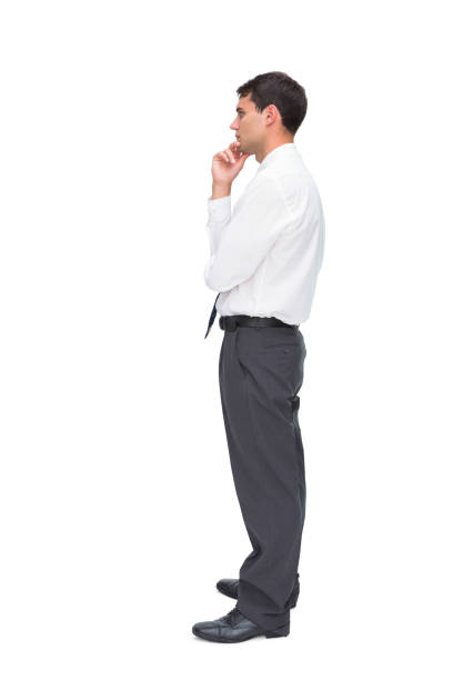 istock Thoughtful young businessman looking away 843803964