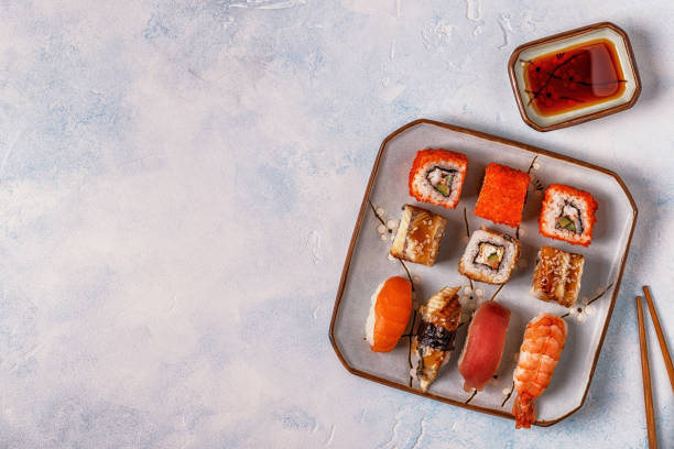 istock Sushi Set: sushi and sushi rolls on plate 843807304