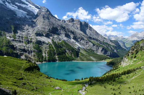 Lake Oeschinen Switzerland-July 2017  lake oeschinensee stock pictures, royalty-free photos & images