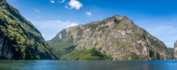 Canyon del Sumidero with blue sky, Chiapas, Mexico. Panoramic view of the Canyon del Sumidero, Chiapas, Mexico. mexico chiapas cañón del sumidero stock pictures, royalty-free photos & images