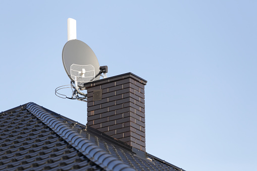 Satellite dish and tv, radio and wireless internet antenna.