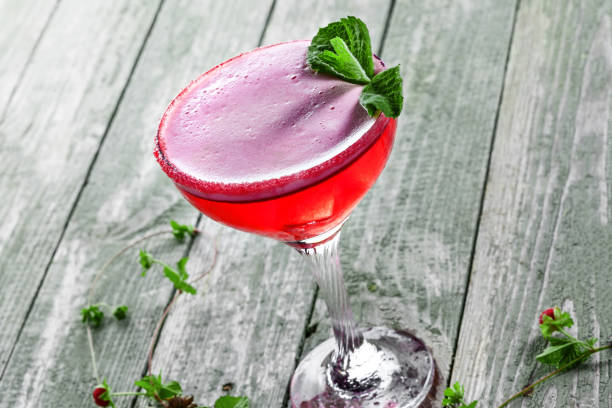 istock Glass of alcoholic raspberry and mint cocktail 843830054