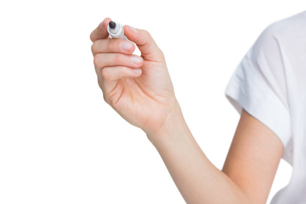 istock Female hand holding black whiteboard marker 843830822