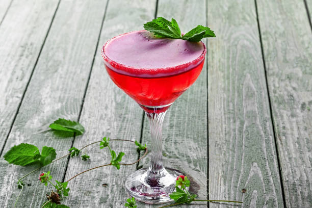 istock Glass of alcoholic raspberry and mint cocktail 843833170