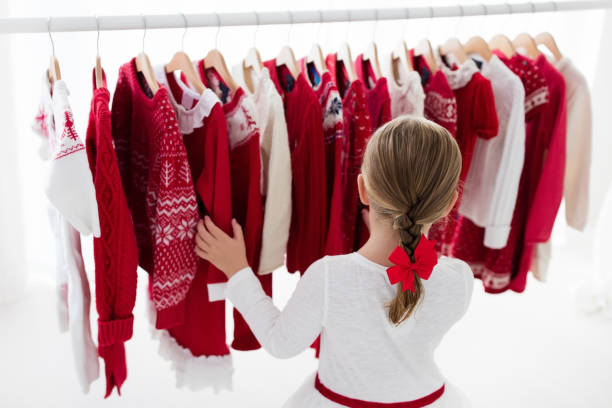 istock Clothes rack with red Christmas knit wear 843833402