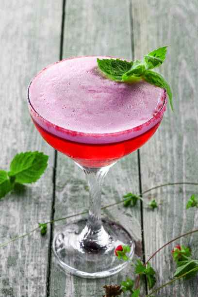 istock Glass of alcoholic raspberry and mint cocktail 843833530