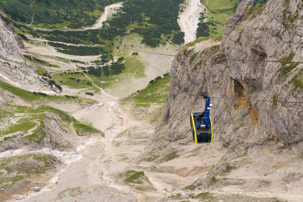istock Cable car Gondola traveling to Dachstein mountain summit 843833690