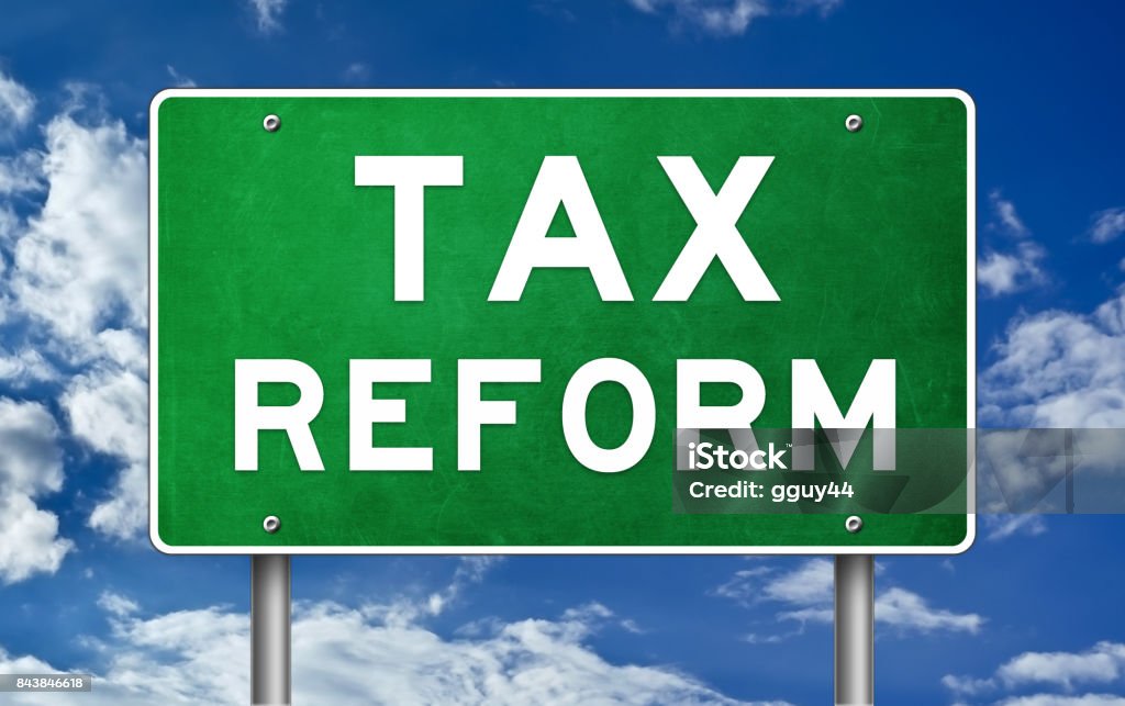 Tax reform - road sign Capital - Architectural Feature Stock Photo