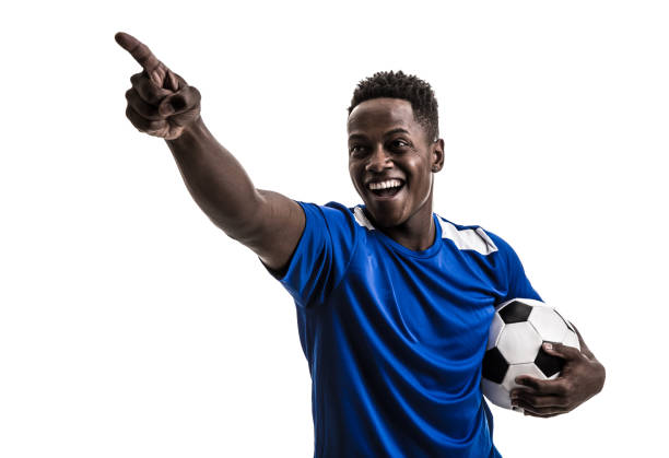 lüfter / sport player auf blaue uniform feiert auf weißem hintergrund - soccer player soccer men smiling stock-fotos und bilder