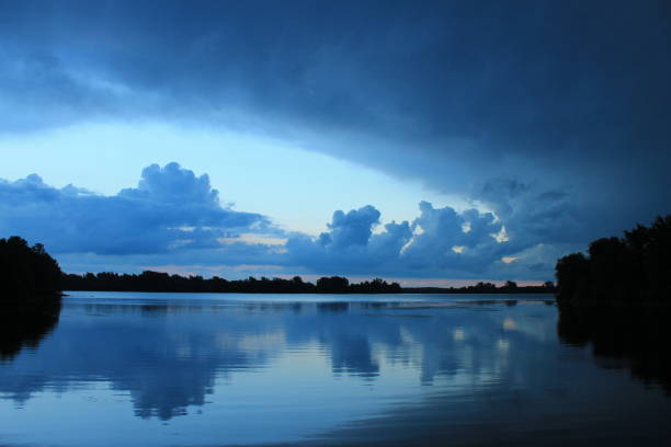 Milles Roches Campground located in Long Sault Ontario. I got a east facing St. Lawrence River photo. The sky was reflecting on the river and trees left right and back...