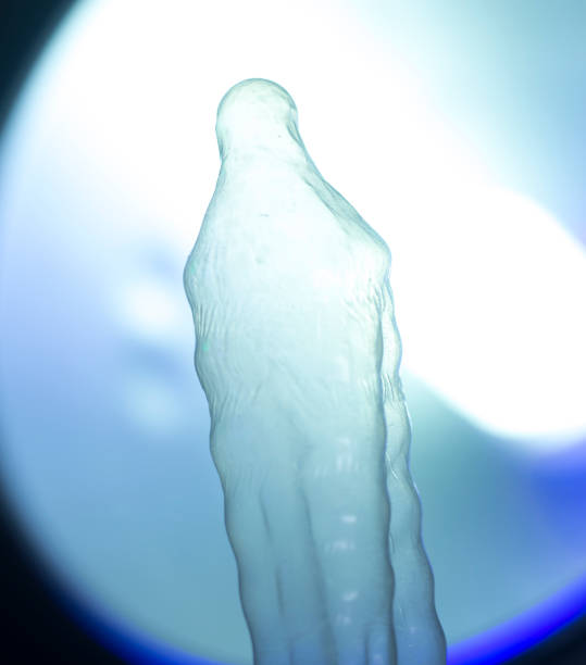 istock Rubber latex condom male contraceptive 843857172