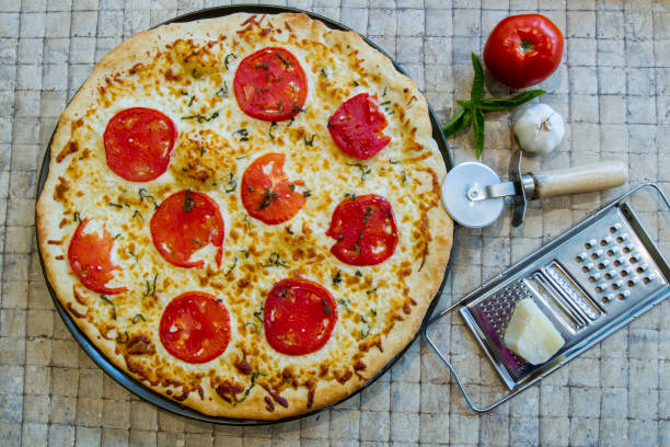 istock Margarita pizza with ingredients 843859828