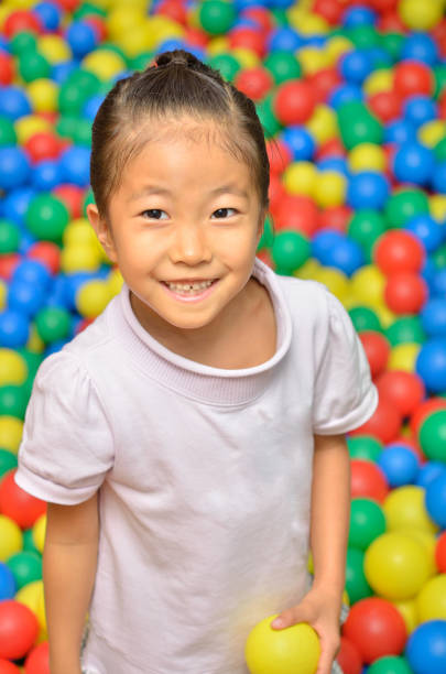 istock Girl playing with ball 843860142