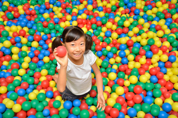 istock Girl playing with ball 843860156