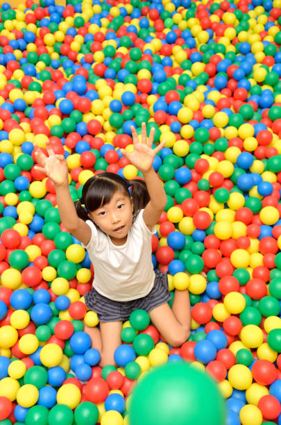 istock Girl playing with ball 843860186