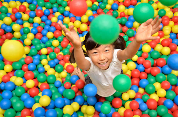 Girl playing with ball