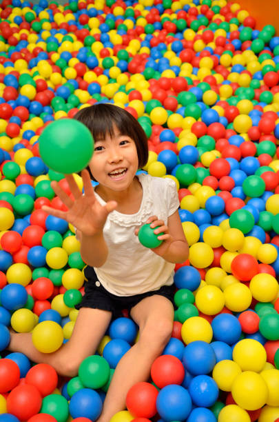 istock Girl playing with ball 843860194