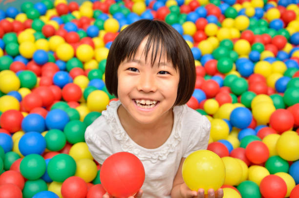 istock Girl playing with ball 843860220