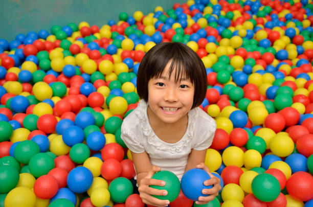 istock Girl playing with ball 843860224