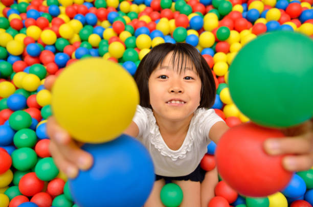 istock Girl playing with ball 843860242