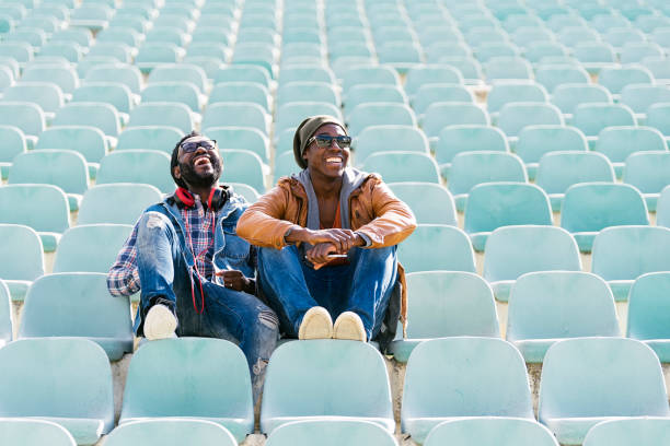 istock Two black race friends having fun in the park. 843860618