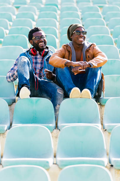 istock Two black race friends having fun in the park. 843860636