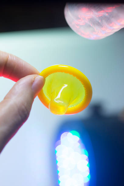 istock Rubber latex condom male contraceptive 843860850