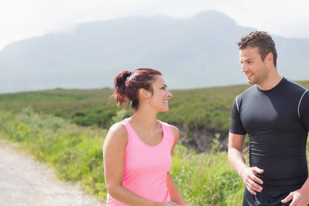 istock Athletic couple taking a break from jogging 843873212