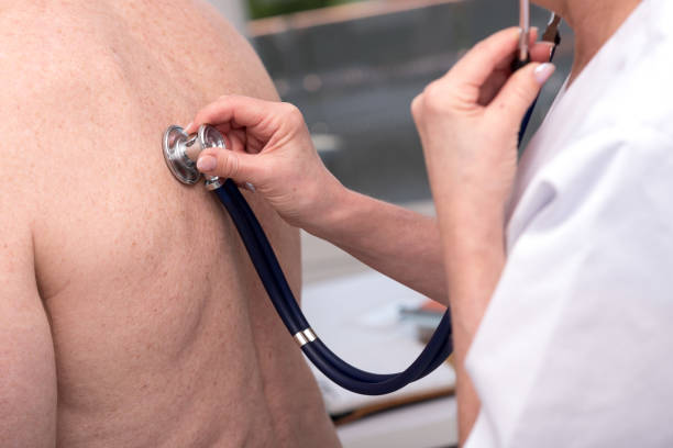 istock Doctor using stethoscope to exam patient 843875074